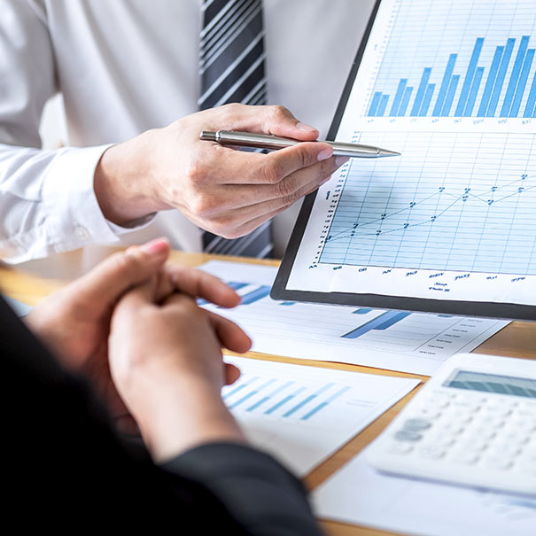 Social media campaign figures and charts viewed on a tablet