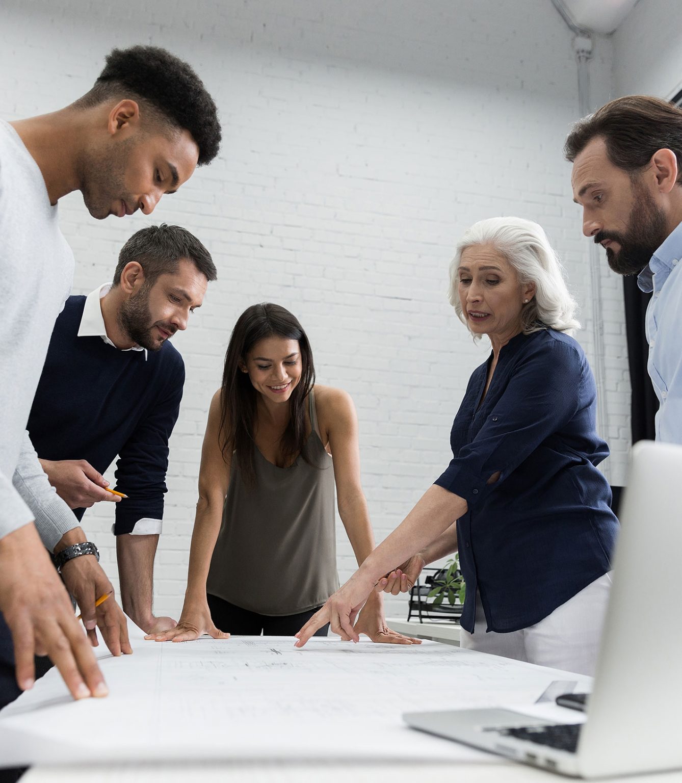 Motiv Marketing team discussing a client's social media strategy